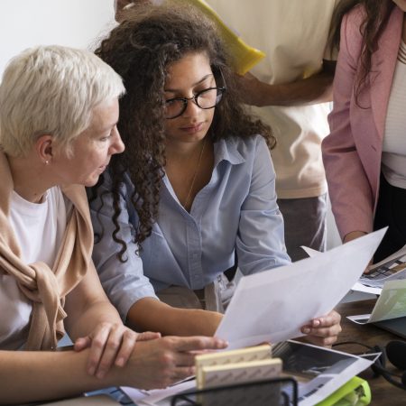 side-view-women-working-together